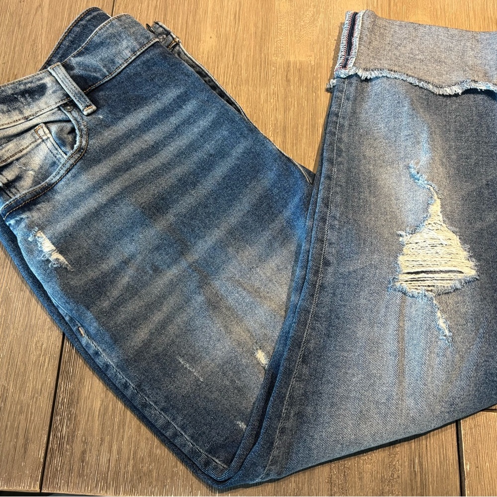 Distressed Blue Denim Jeans